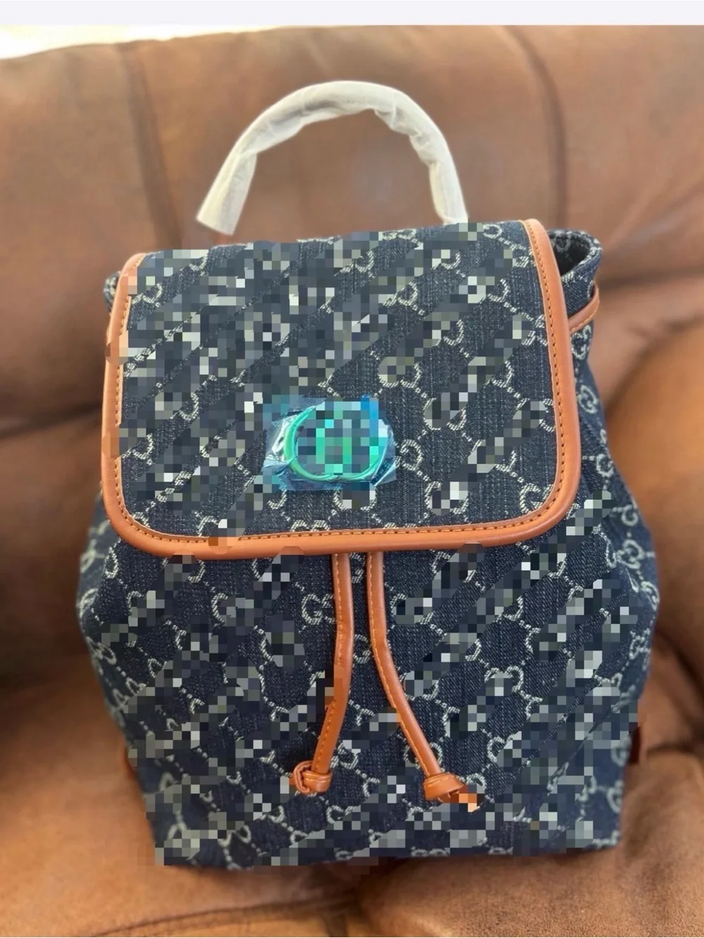Denim Monogram Drawstring Backpack with Tan Trim